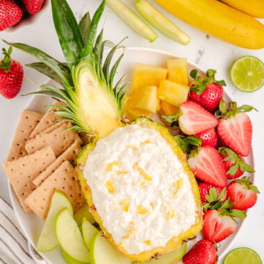 creamy pineapple fruit dip served in a fresh pineapple