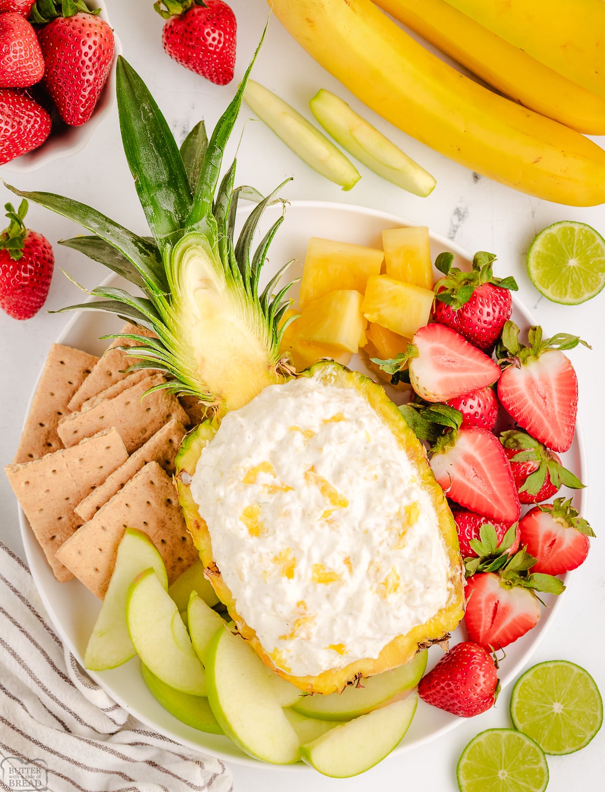 creamy pineapple fruit dip served in a fresh pineapple