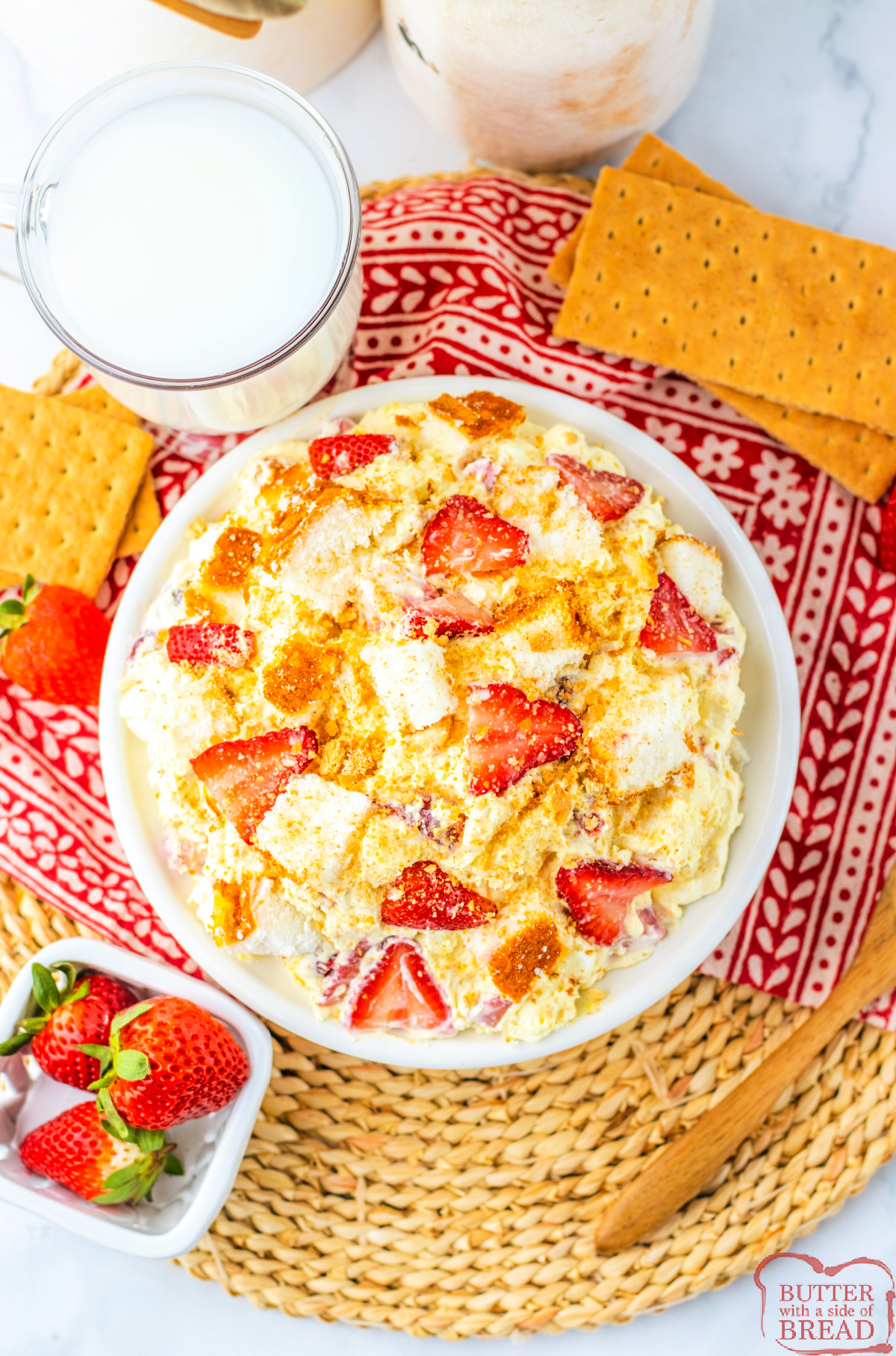 Close-up of creamy Strawberry Shortcake Fluff with chunks of cake, strawberries, and marshmallows.
