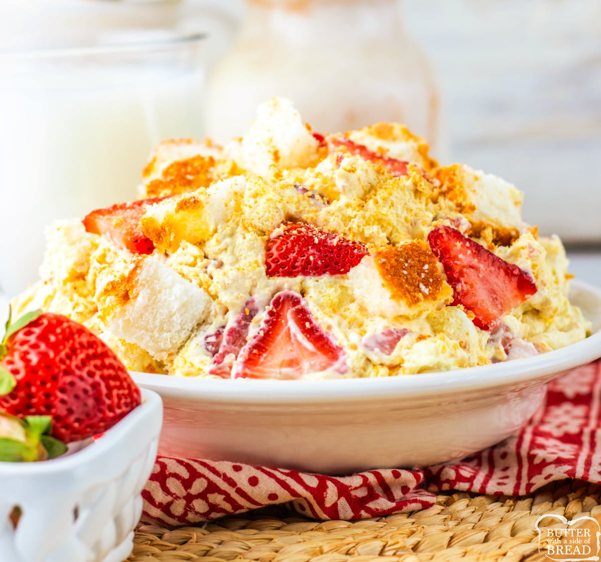 Strawberry Shortcake Fluff Salad is a quick no-bake dessert made with pudding, whipped topping, strawberries, angel food cake & marshmallows!