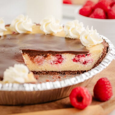 baked raspberry cheesecake topped with chocolate