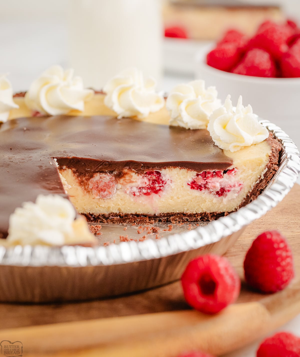 baked raspberry cheesecake topped with chocolate