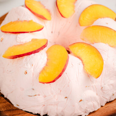 peach bavarian with fresh peaches on top