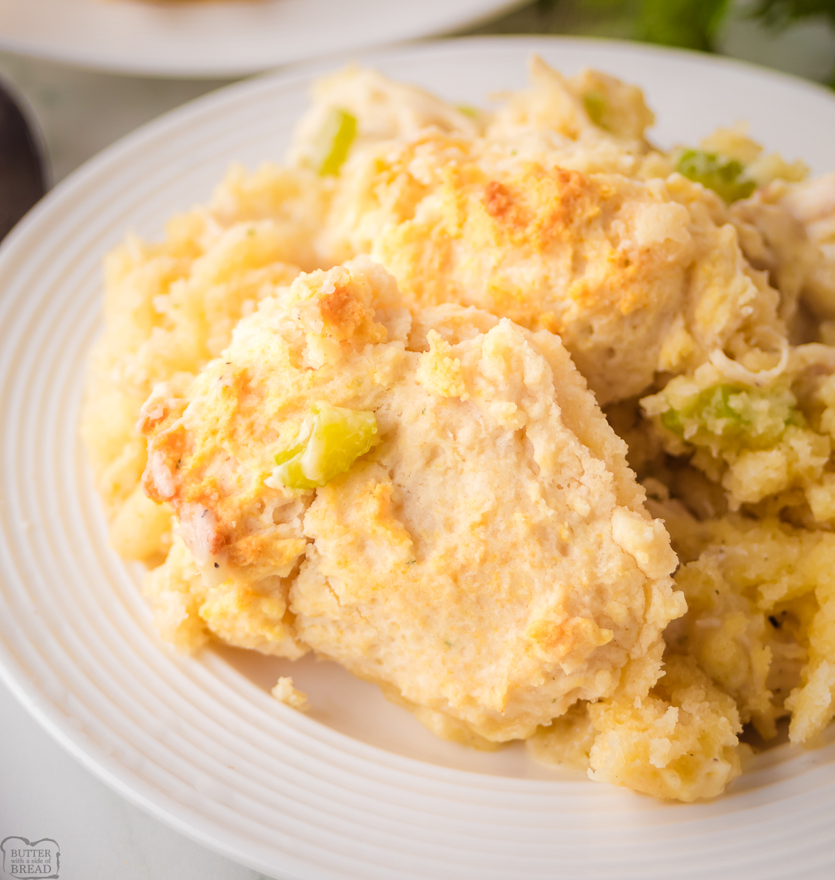 serving of chicken pot pie with cheddar biscuits on top