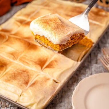 pumpkin Texas sheet cake dusted with cinnamon