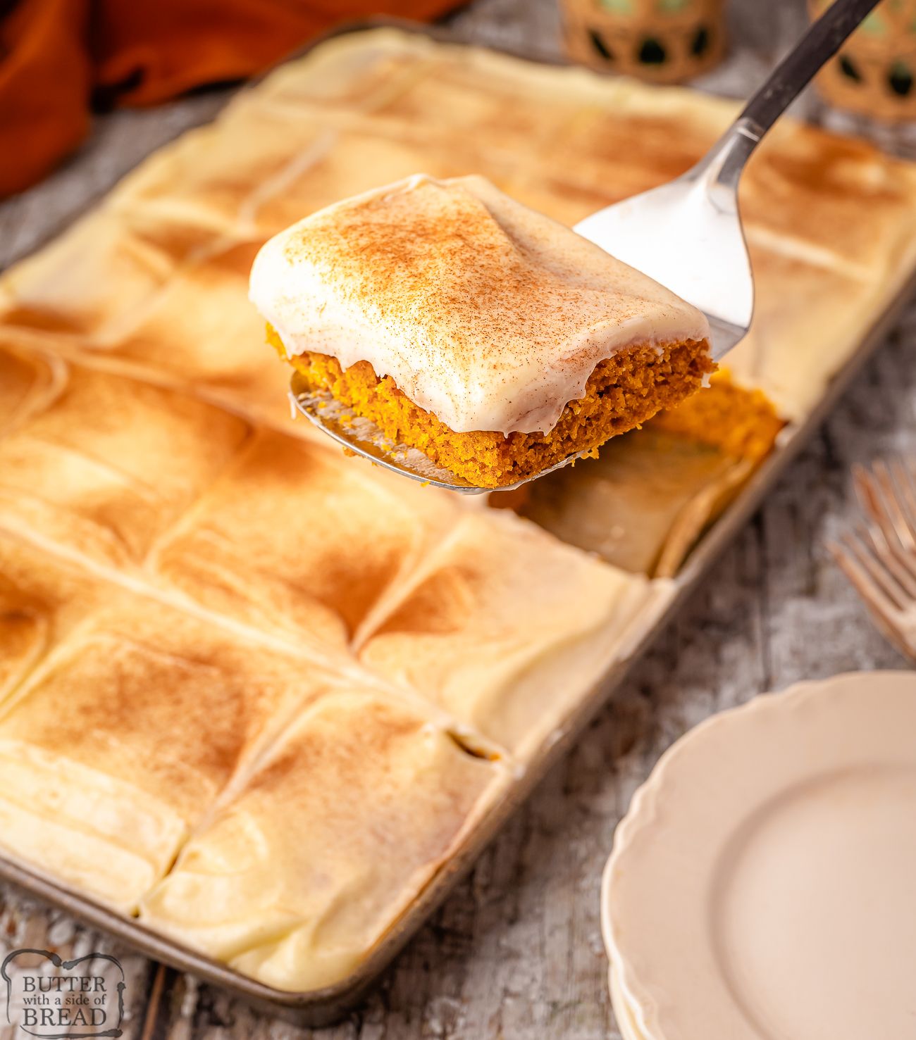 pumpkin Texas sheet cake dusted with cinnamon