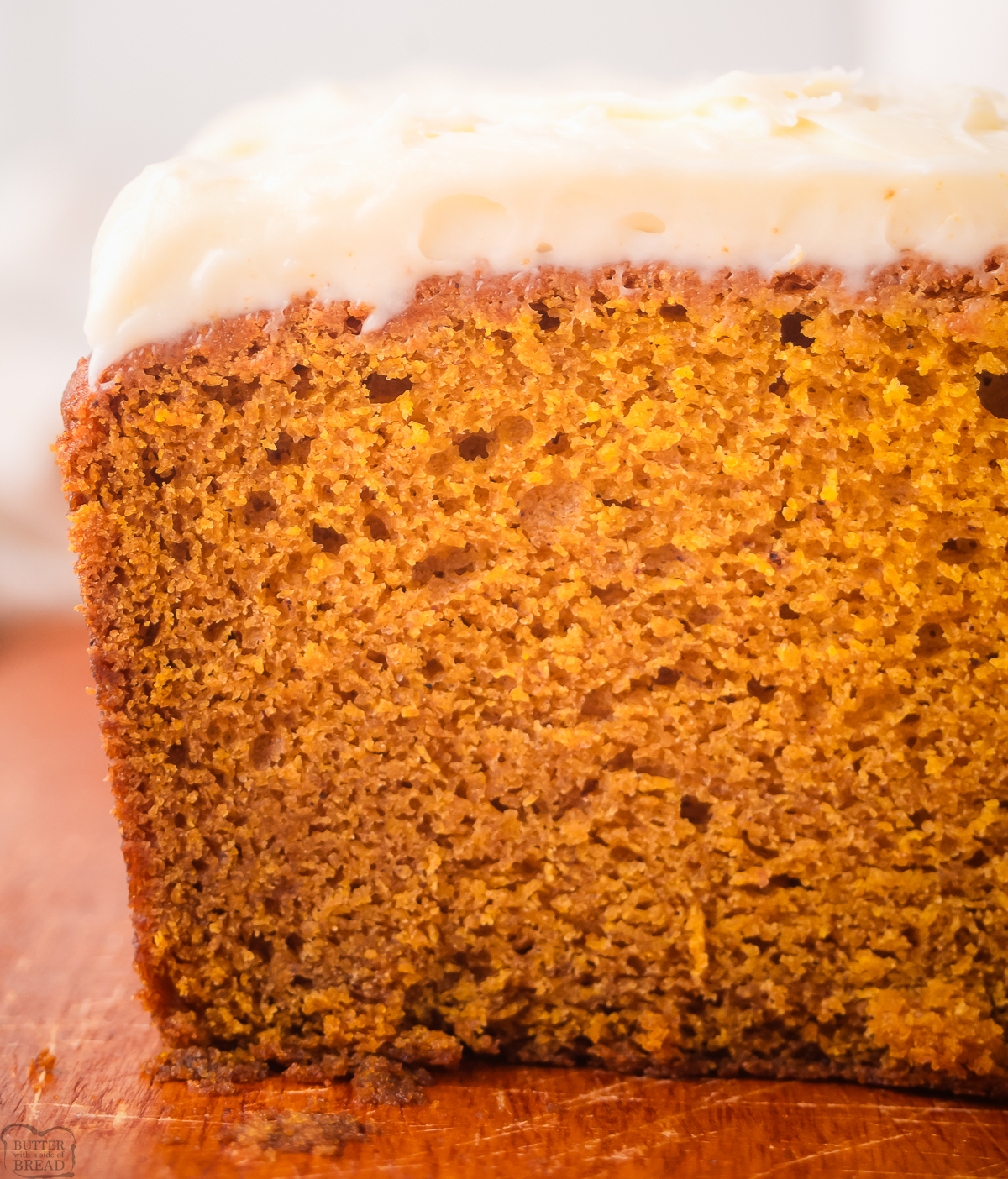 loaf of frosted pumpkin bread
