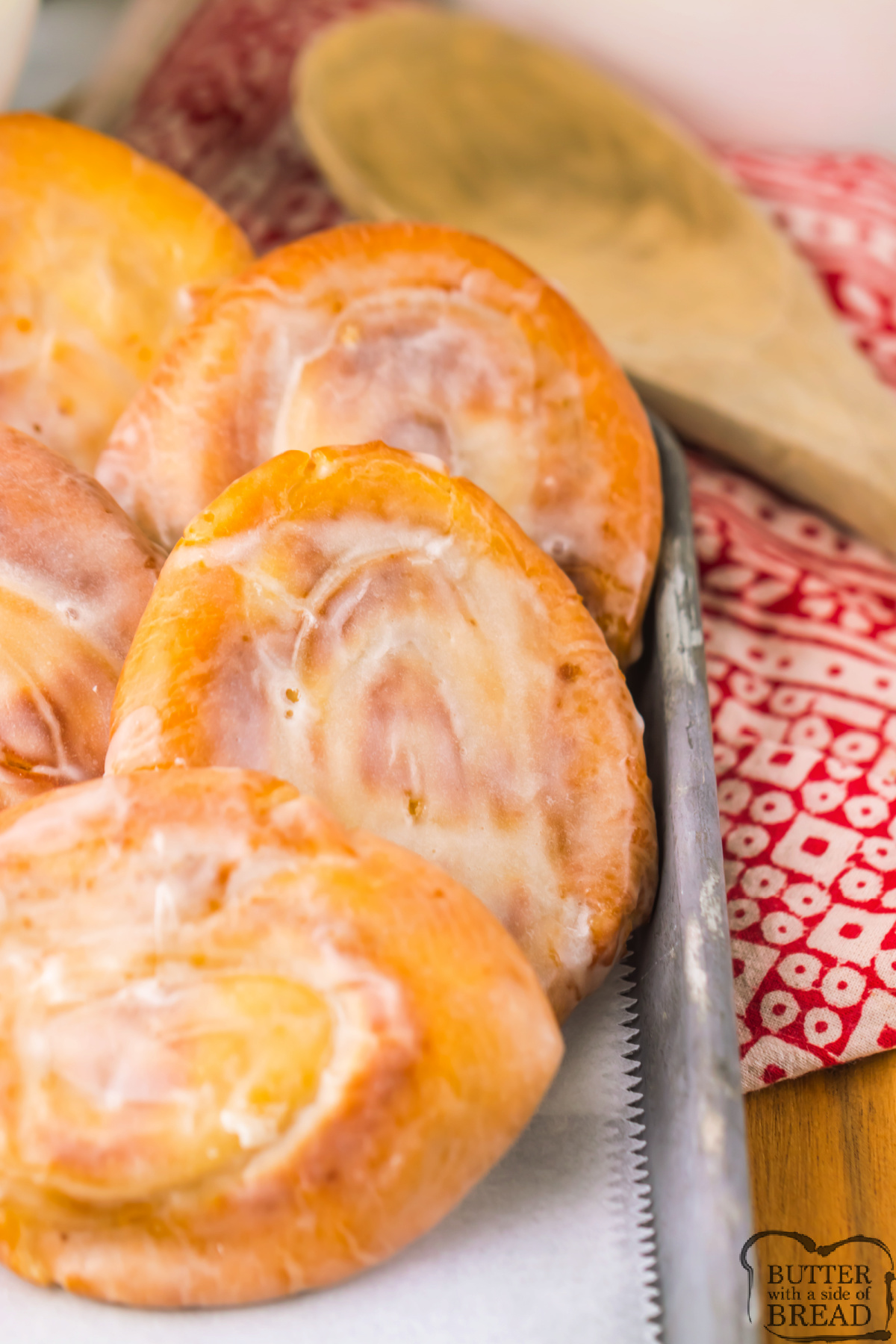 Try these Homemade Honey Buns for the perfect soft and sticky glazed pastry that tastes even better than the packaged honey buns from the store.