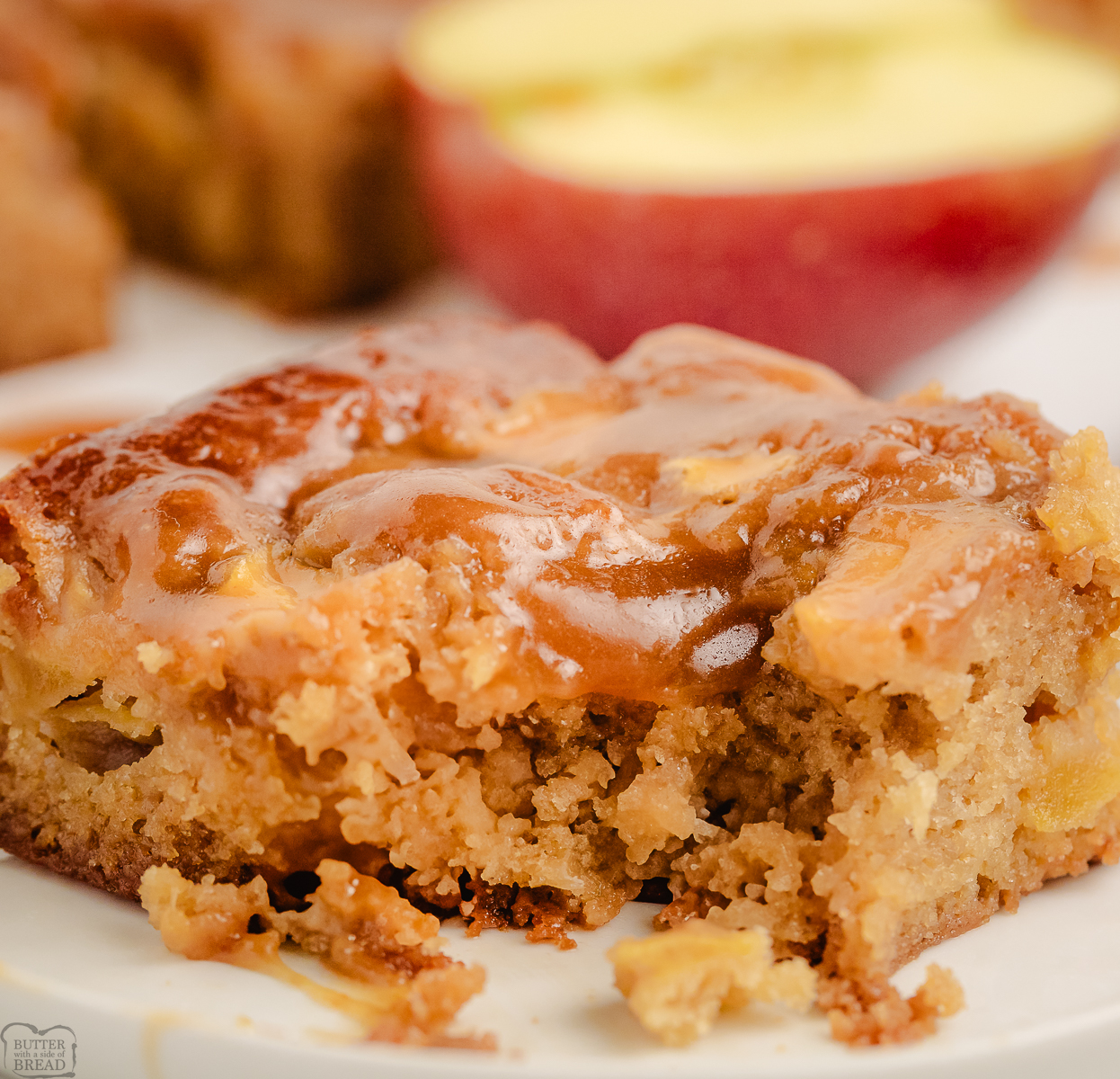 apple blondies topped with a maple glaze