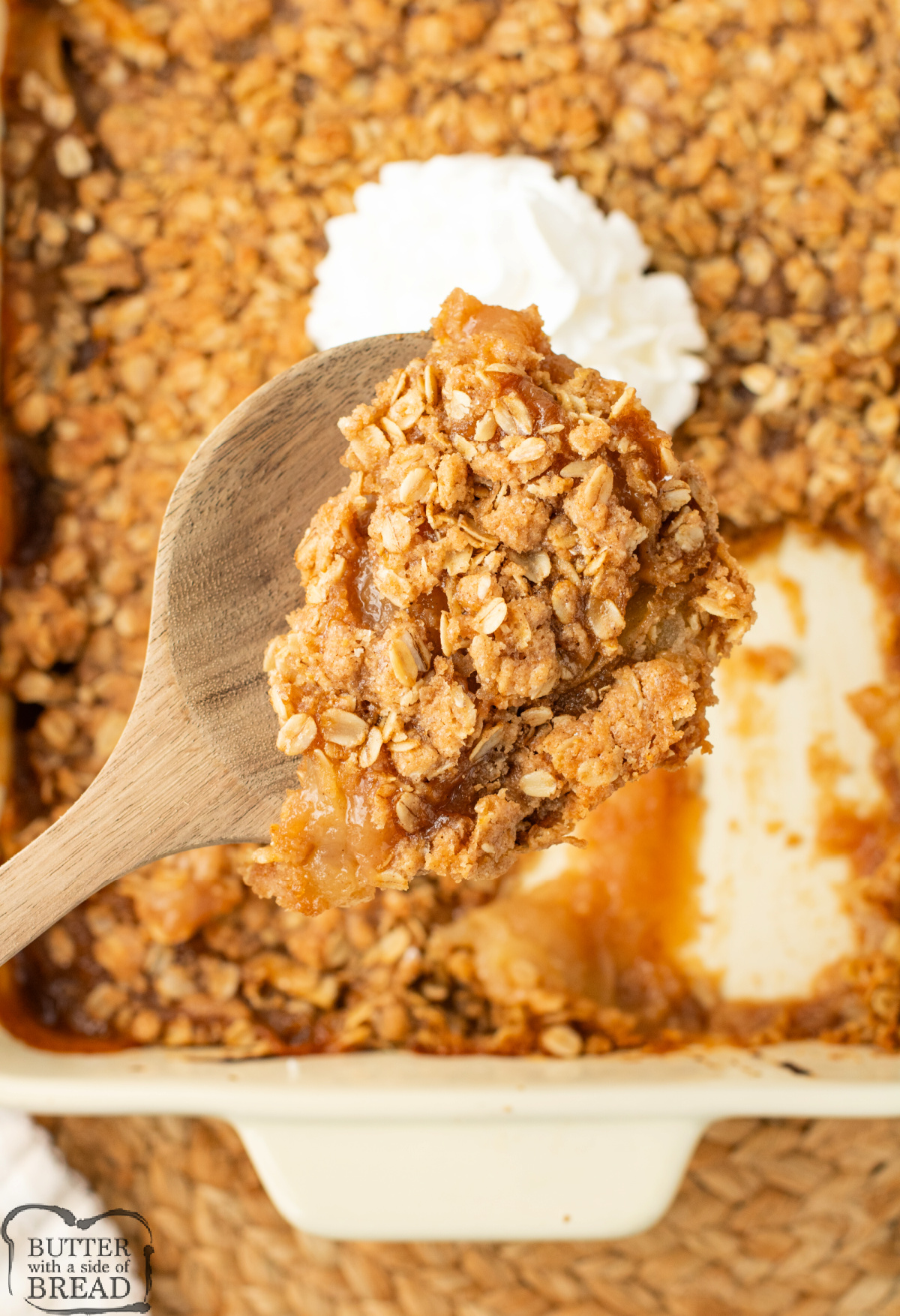 Warm applesauce crisp with cinnamon oat crumble on top.