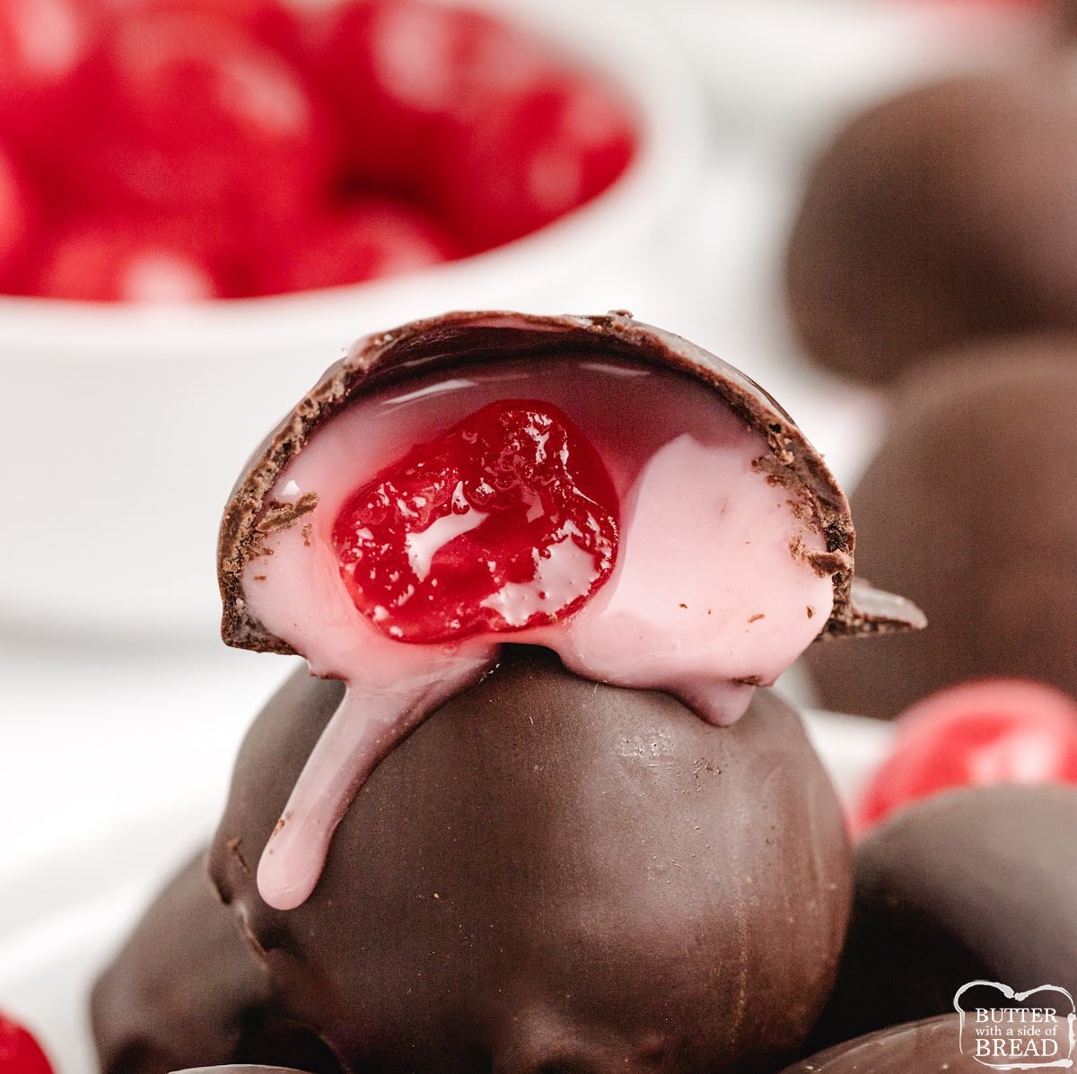 Homemade cordial-style chocolate-covered cherries with firm chocolate shells.