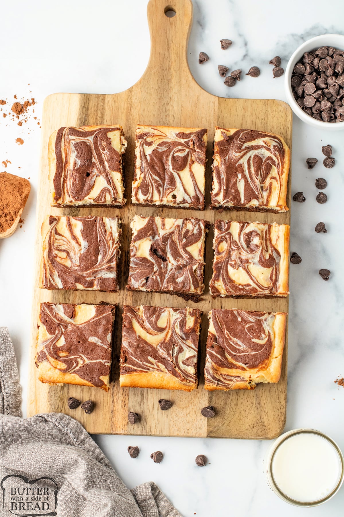 Thick, fudgy cheesecake brownies ready to serve.