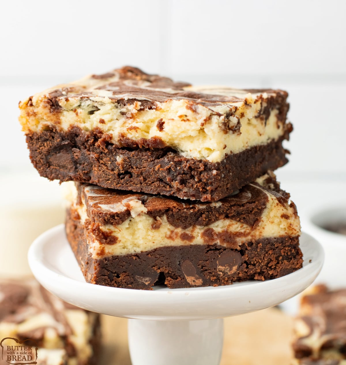 Cheesecake brownies with a rich chocolate base and creamy cheesecake swirl.