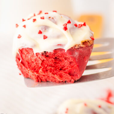 red velvet cinnamon roll being served