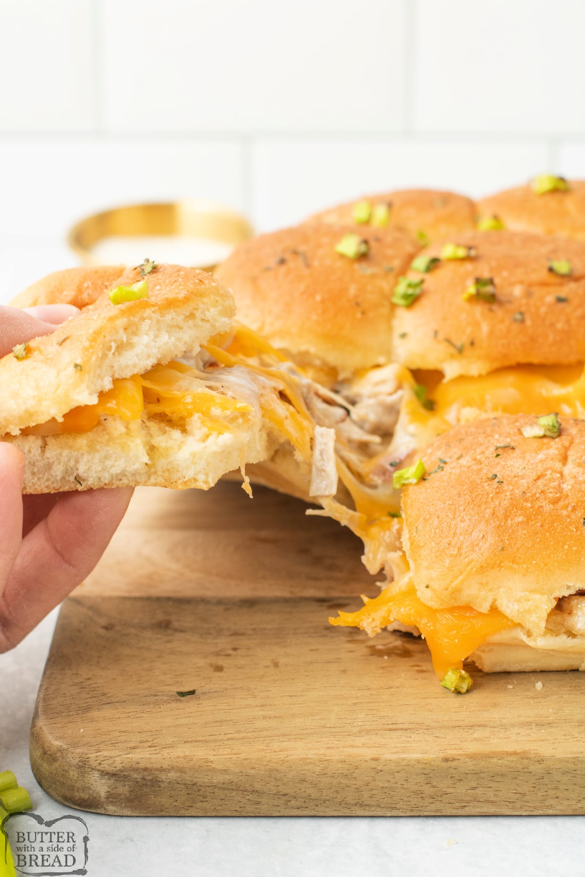 Pull apart chicken bacon ranch sliders with golden buttery tops.