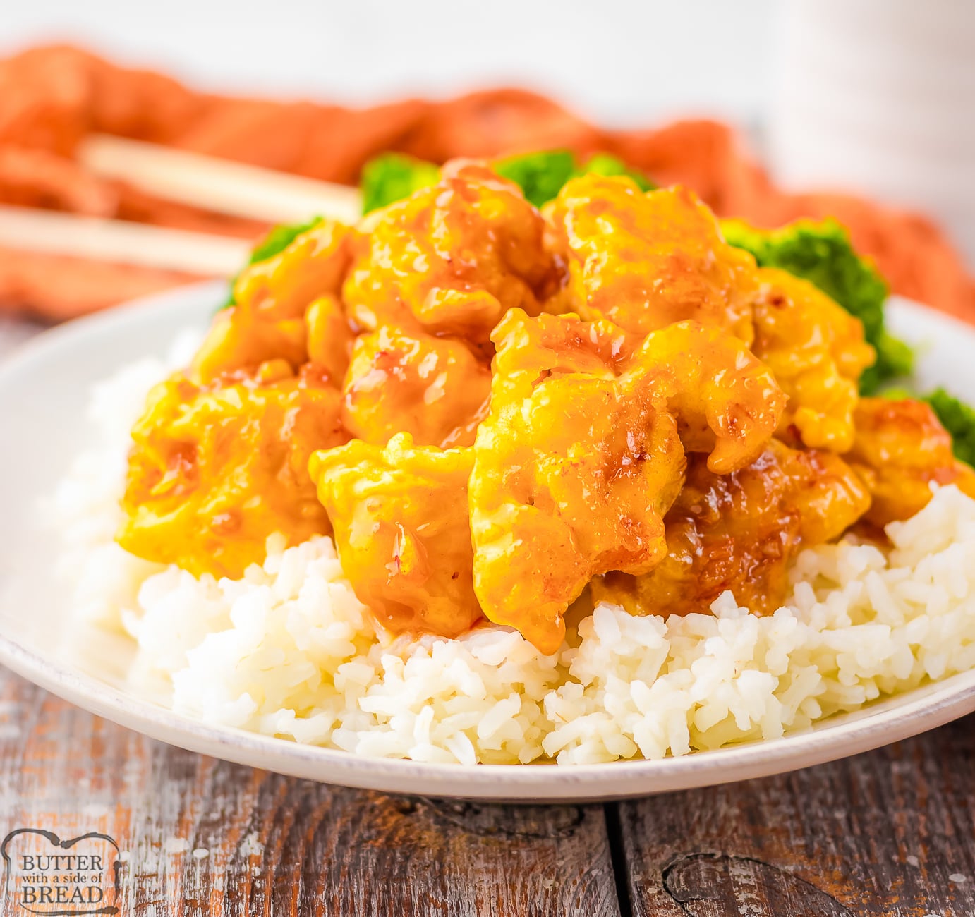 plate of copycat Panda Express Orange Chicken with rice and broccoli