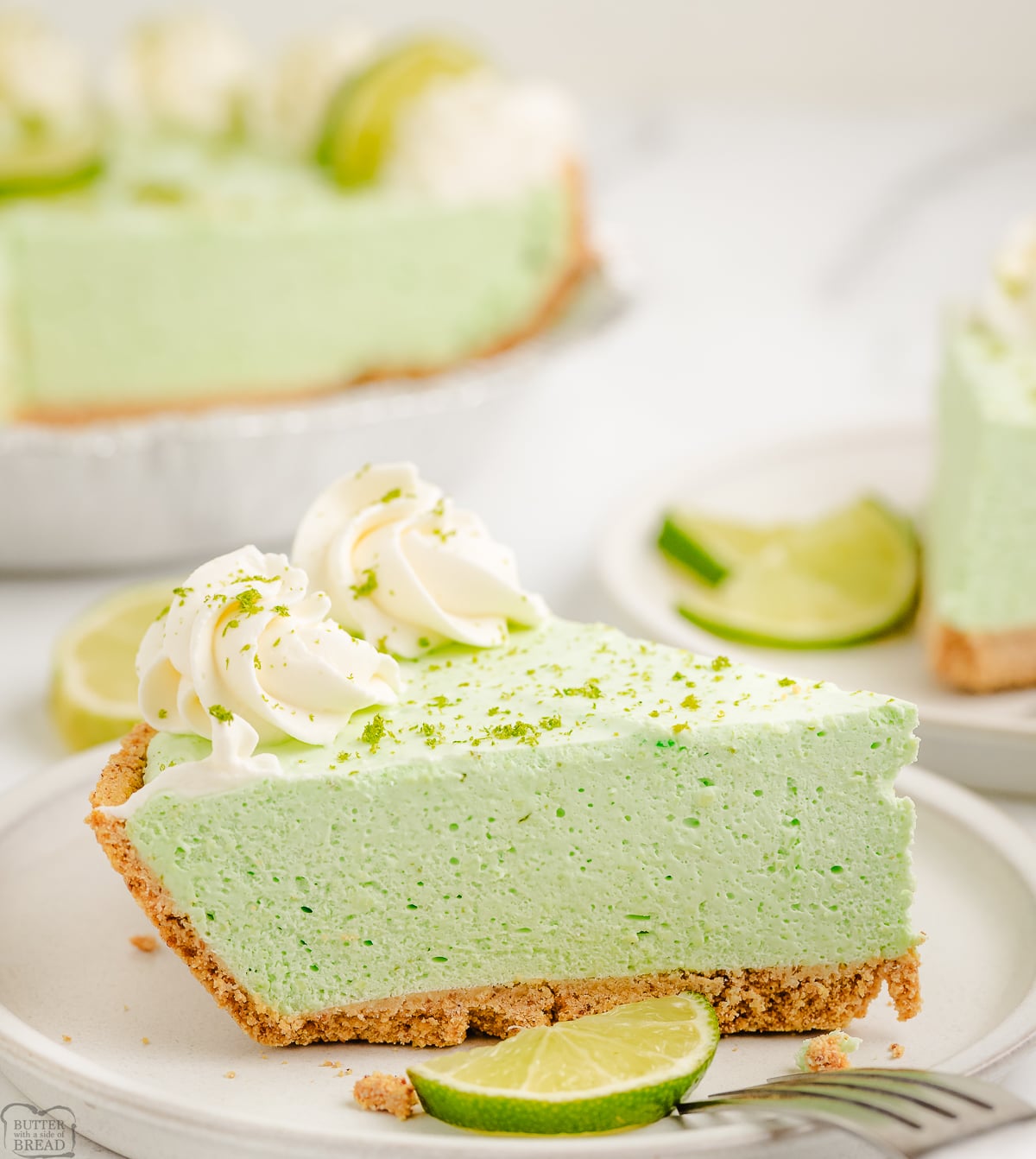 slice of lime chiffon cream pie on a white plate