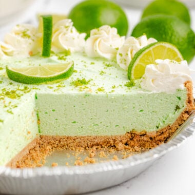 lime chiffon cream pie cut with a slice out