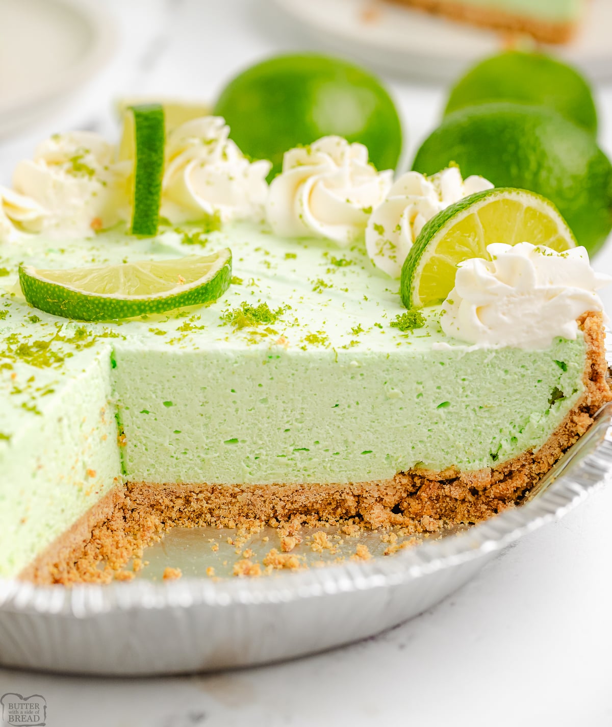 lime chiffon cream pie cut with a slice out