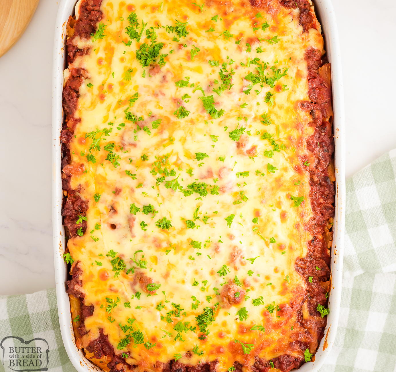 baked ziti casserole with melted cheese on top
