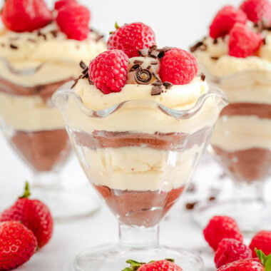 layered chocolate mousse cups topped with fresh berries