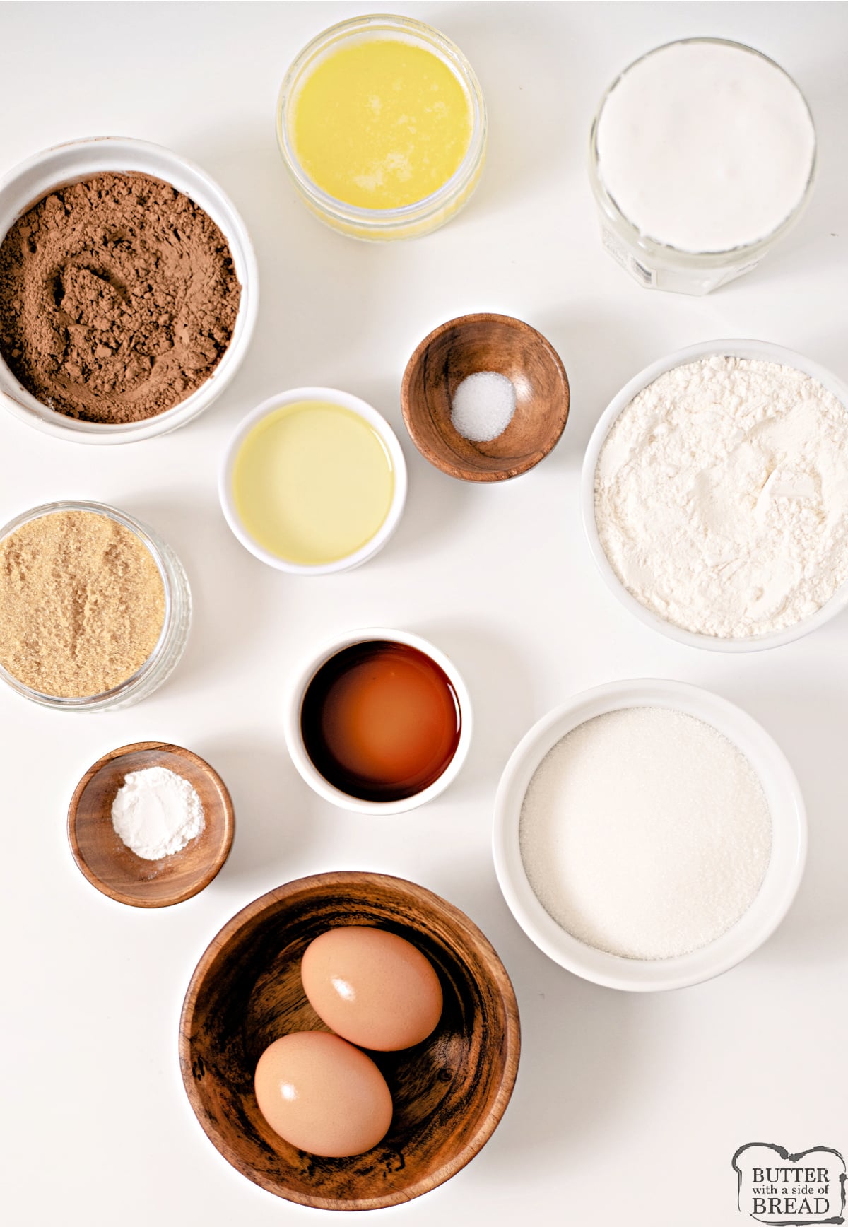 Ingredients for toasted marshmallow brownies including cocoa powder and marshmallow creme